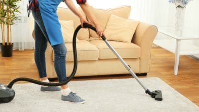 Mom Syndrome woman vacuuming