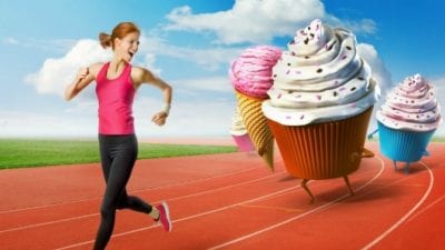 Woman jogger running from cupcakes, repeating behavior rewarded