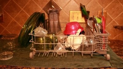 Wash Dishes by Hand dish drainer on countertop