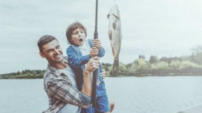 Prejudice - father and son fishing