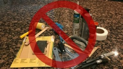 clean countertops by removing home repair items