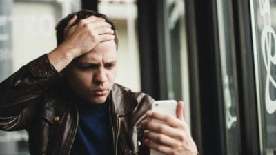 young man is angry by texting session