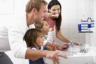 Bidding Variables Family brushing teeth all in one bathroom
