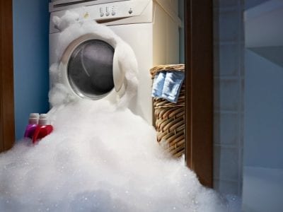 Survival Tool for House Cleaners, Washing Machine Overflowing With Suds-min