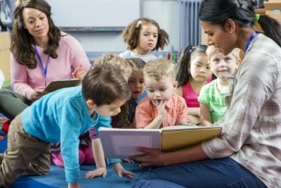 Daycare to House Cleaner, Teachers and Children at Storytime