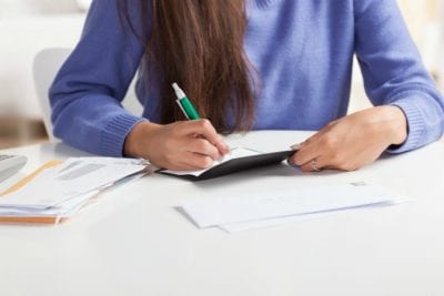 MLM's and House Cleaners, Woman Writing Check