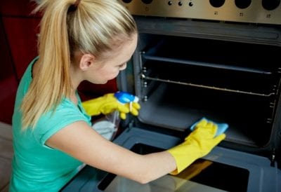 Price Your Service, Woman Cleaning Oven