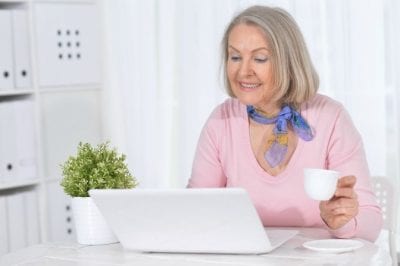 Price Your Service, Woman Drinking Tea at Her Home Computer