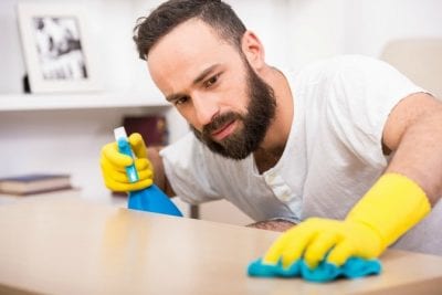 Male House Cleaners, Man Wiping Counter