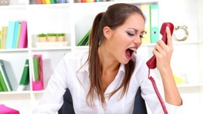 Social Media Presence Angry house cleaner on phone looks angry