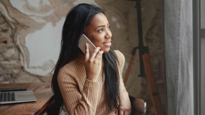 Startup Struggles include African American Woman Making Calls