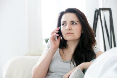 Who Pays When Stuff Breaks, Woman on Phone