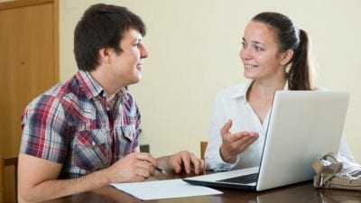 Auditions for House Cleaning young couple at computer talking