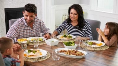 How Much to Clean 5 Rooms family eating dinner together