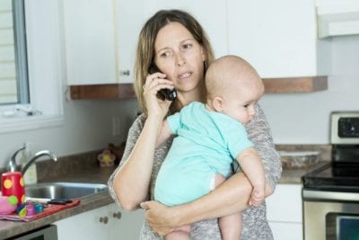 Do You Need a Housekeeper, Woman With Baby on Phone