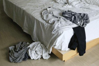The Pre-Walkthrough, Clothes Laying on Unmade Bed