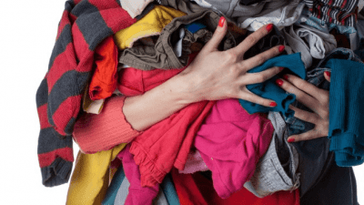 How do you know it's junk woman holds pile of laundry