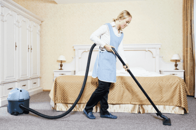 Clients Not Customers, Woman Vacuuming