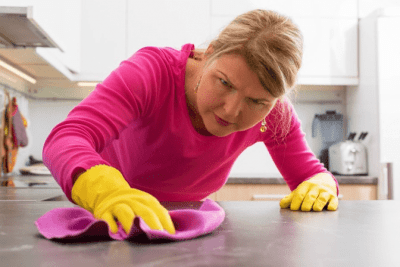 Customers Insist You Use Their Cleaning Supplies, Woman Cleaning Counter