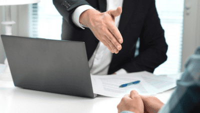How Workers Compensation Works attorney shaking hands with customer