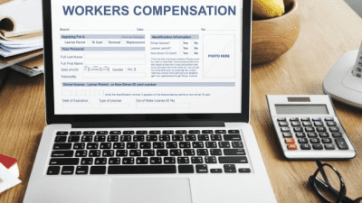 How Workers Compensation Works computer with workers comp on screen
