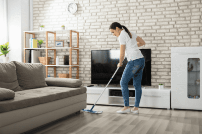 Stay Safe When Cleaning Solo, Woman Mopping