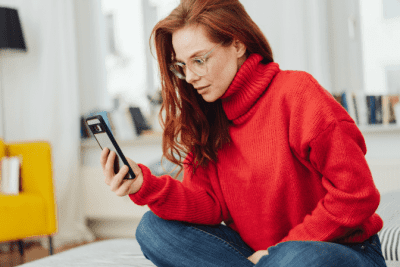 Too Depressed to Clean, Woman Looking at Phone