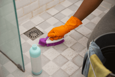 Base Rate or Charge More for a Deep Clean, Scrubbing Bathroom Tile