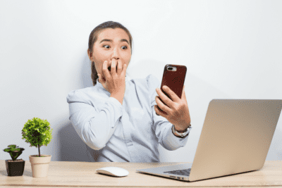 Do You Need a Business Plan, Surprised Woman Looking at Phone