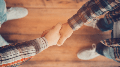 Help Your Competition Shaking Hands Closeup