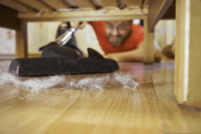 Rundown Apartment, Vacuuming Under Bed