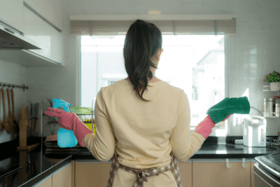 How to Get Your Cleaning Mojo Back, Back of Woman in Clean Kitchen