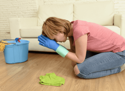 How to Get Your Cleaning Mojo Back, Sad Woman Cleaning