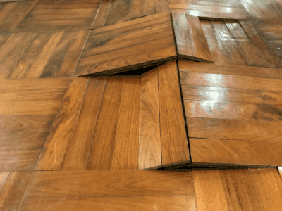 When a Client Refuses a Reclean, Warped Wood Floor