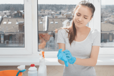 Big Mistakes House Cleaners Made 8-11, House Cleaner Putting on Gloves