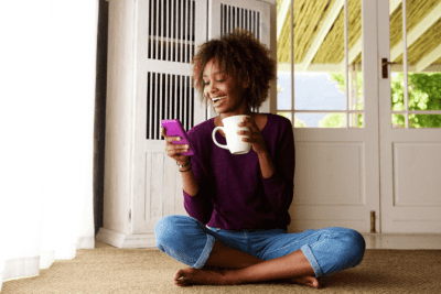 House Cleaning Side Hustle, Woman Looking at Phone