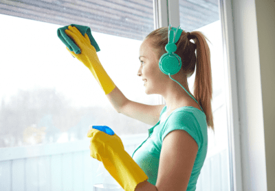 The Results from 900 House Cleaning Shows, Woman Wears Headphones While Cleaning Window
