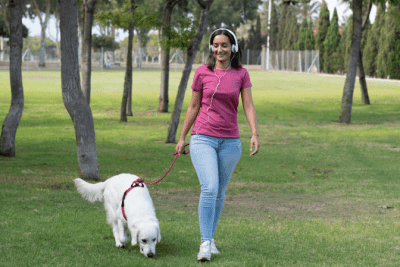 The Results from 900 House Cleaning Shows, Woman Wears Headphones While Walking Dog