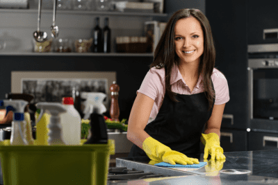 What I Learned from Cleaning Houses for Celebrities, Woman Cleaning Kitchen