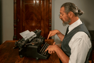 The Need to Pivot, Man Typing on Typewriter