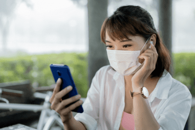 Choose to NOT Be Offended, Woman Holding Phone Wearing Mask and Earbuds