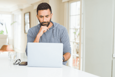 Facebook Friends With Your Customers, Man Thinking with Laptop