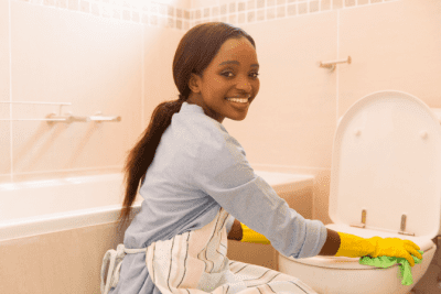 How COVID Changed House Cleaning Forever, Woman Cleaning Toilet