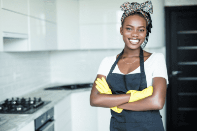How Do You Follow Up After a Walkthrough, House Cleaner Smiling in Kitchen