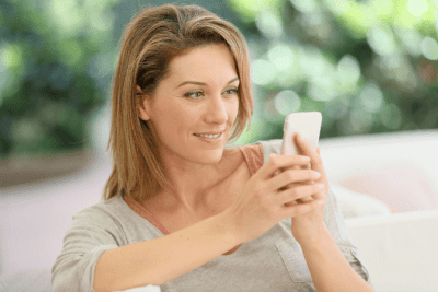 How Do You Follow Up After a Walkthrough, Woman Looking at Phone