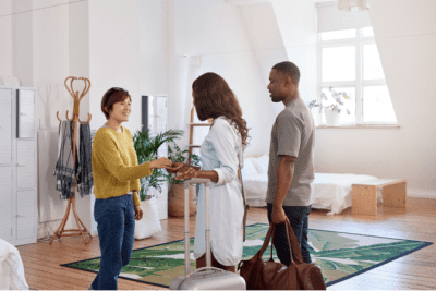 Airbnb Cleaning Starting Out, Woman Greeting House Guests
