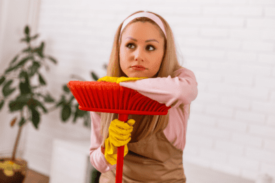 How to Clean Stairs, House Cleaner Thinking with Broom