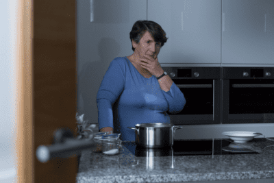 Living With a House Cleaner, Woman Thinking While Cooking