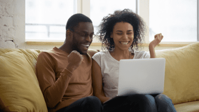 Self Doubt as a Business Owner, Excited Man and Woman Watching Laptop