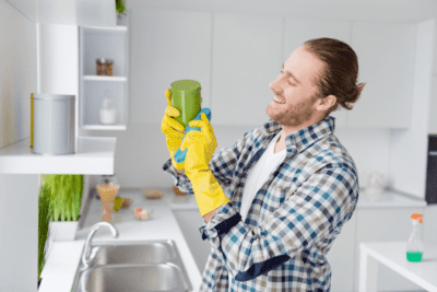 Too Much Competition, Man Cleaning Kitchen